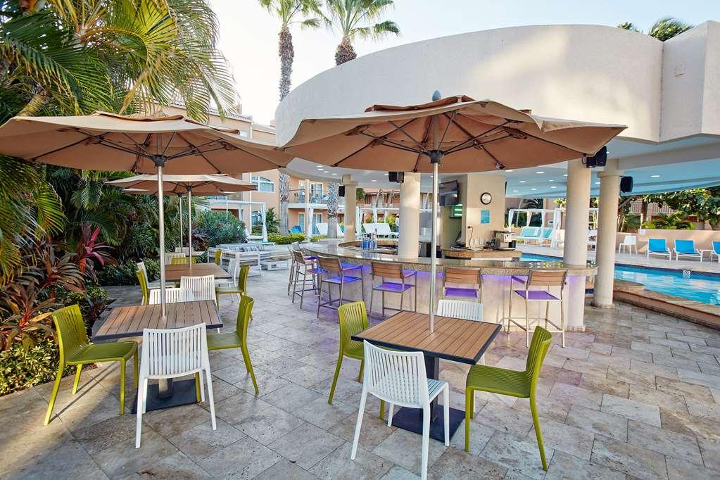Divi Dutch Village Beach Resort شاطئ بالم المطعم الصورة